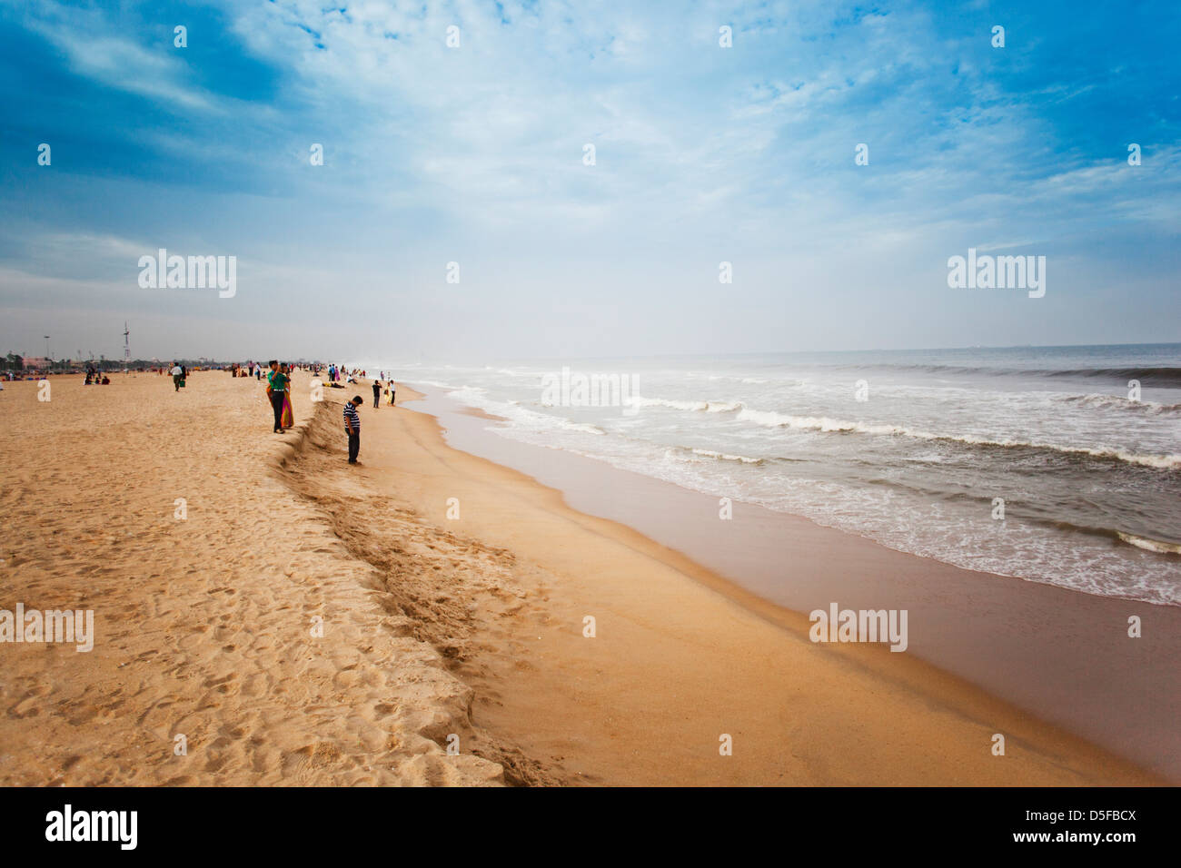 Tourists enjoying on the beach, Chennai, Tamil Nadu, India Stock Photo