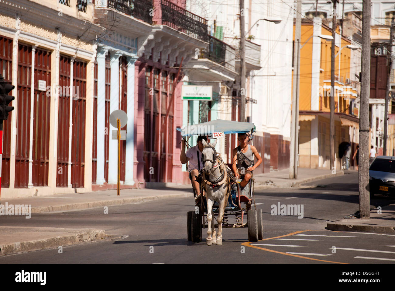 typical street and horse cart taxi in Cienfuegos, Cuba, Caribbean Stock Photo