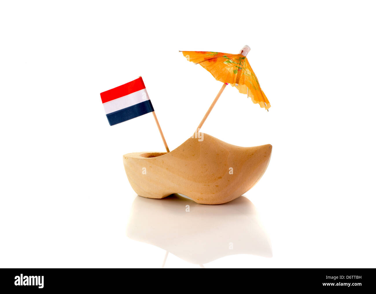 dutch wooden shoe with netherland flag in orange red white and blue Stock Photo