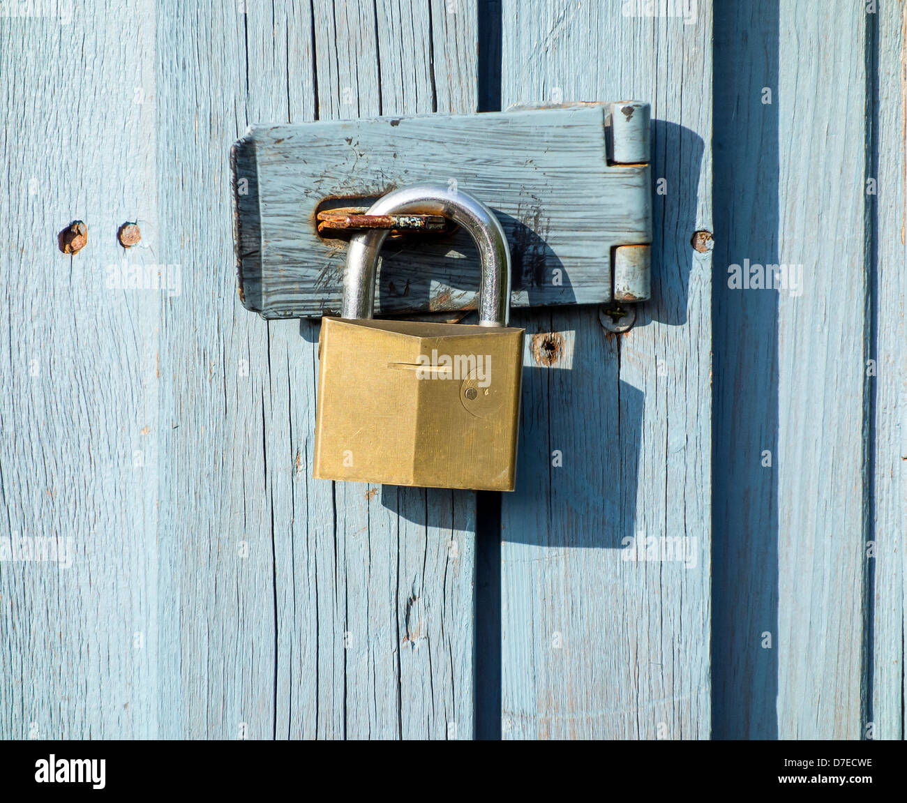 Padlock and Hasp on Allotment Shed Door Security Stock Photo