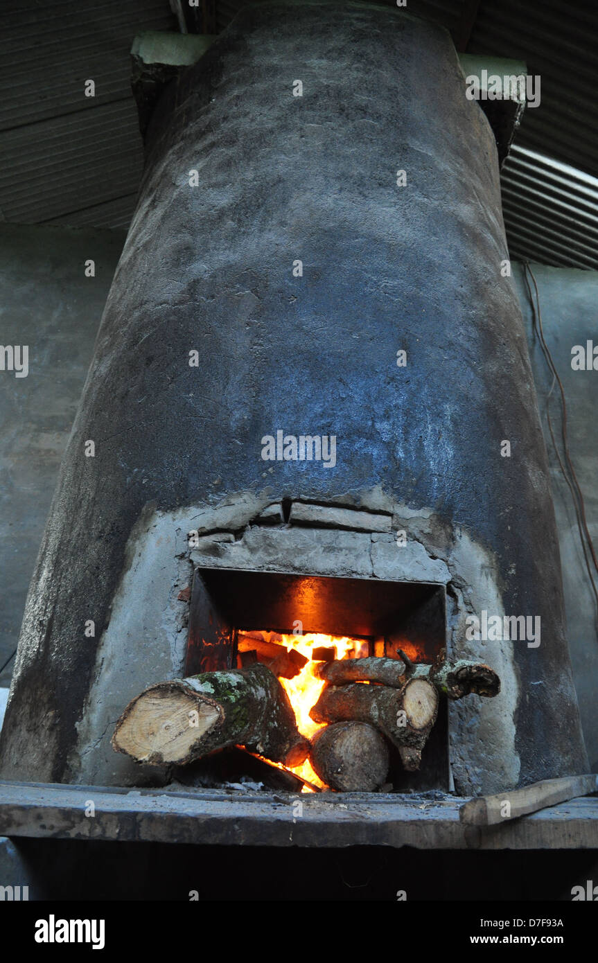 Big stove used to dry out water from woods Stock Photo