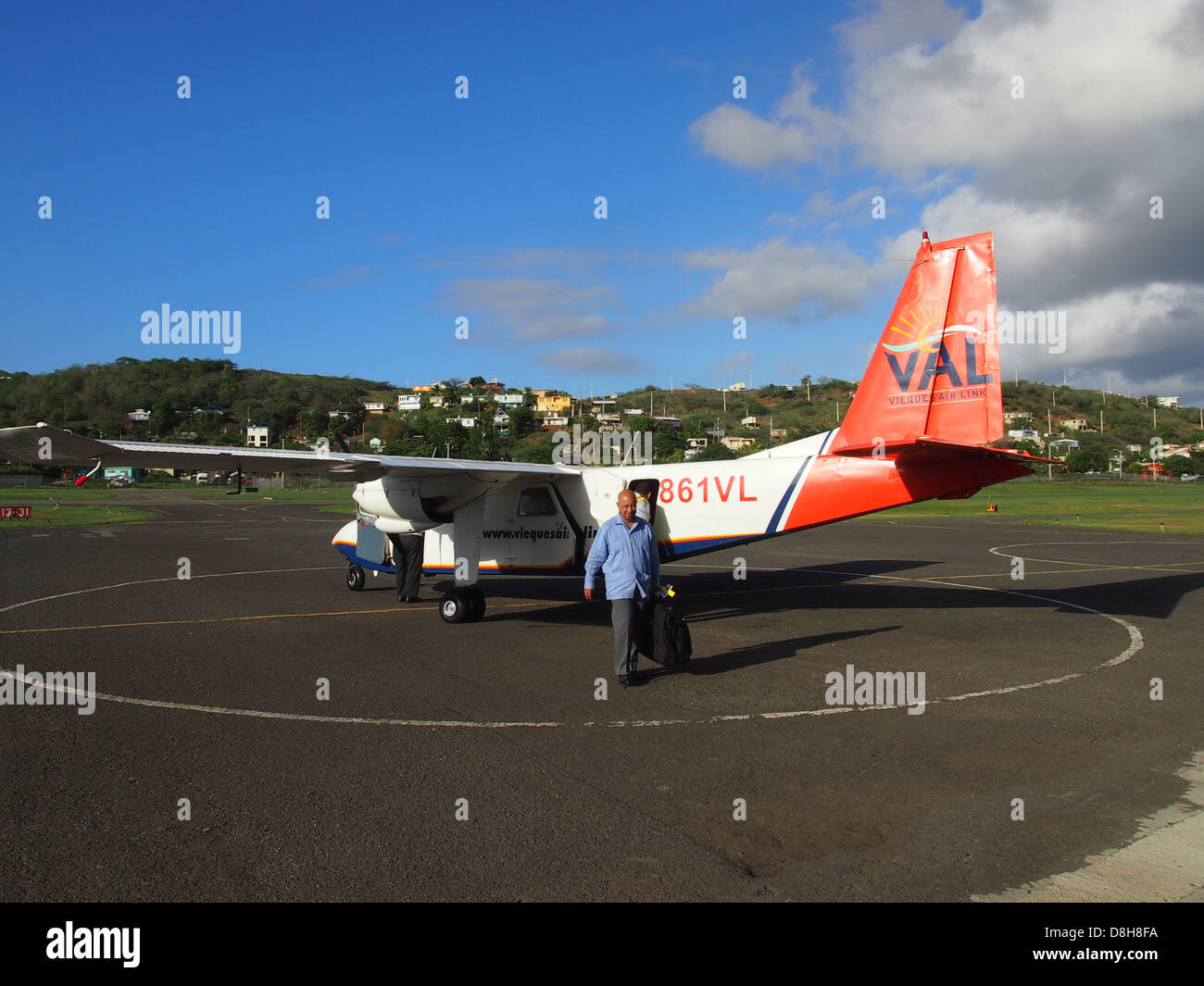 Getting off a small airplane Stock Photo