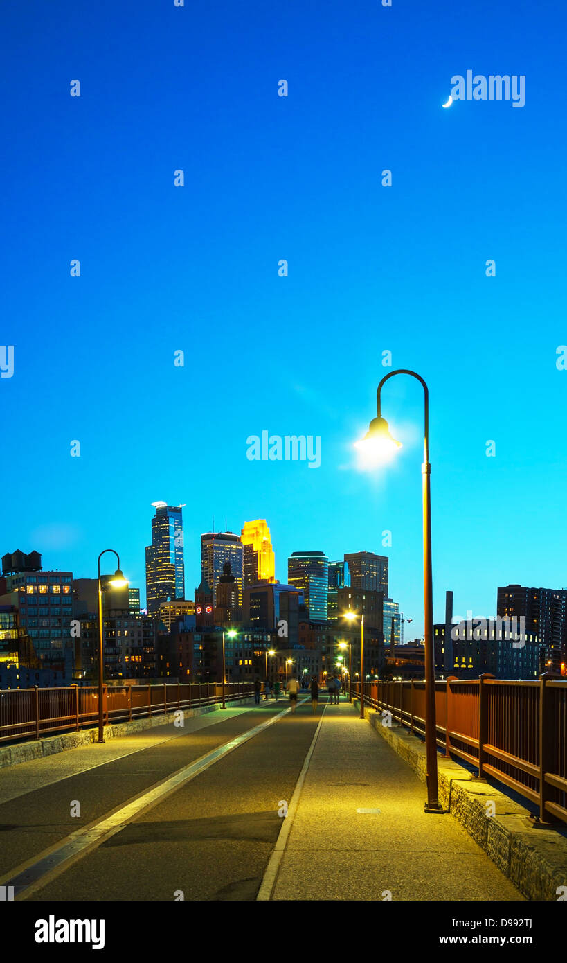 Downtown Minneapolis, Minnesota at night time as seen from the famous Stone Arch bridge Stock Photo