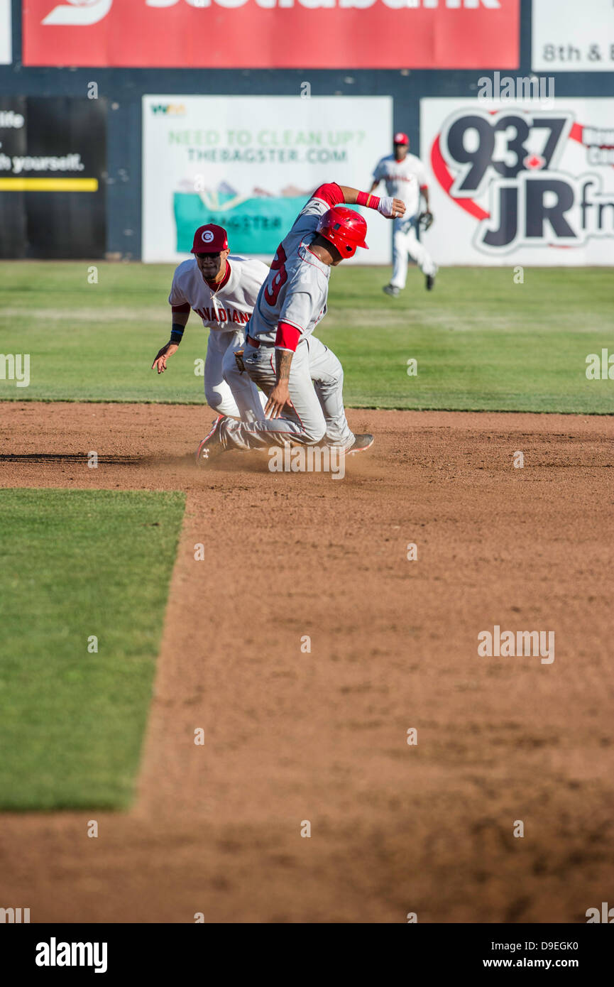 Spokane Indians marcus greene Catcher (29) sliding to second base in the seasons first home game between Vancouver Canadians and Spokane Indians at Scotiabank Field at Nat Bailey Stadium Vancouver , British Columbia Canada on June 17 2013 . Photographer Frank Pali Stock Photo