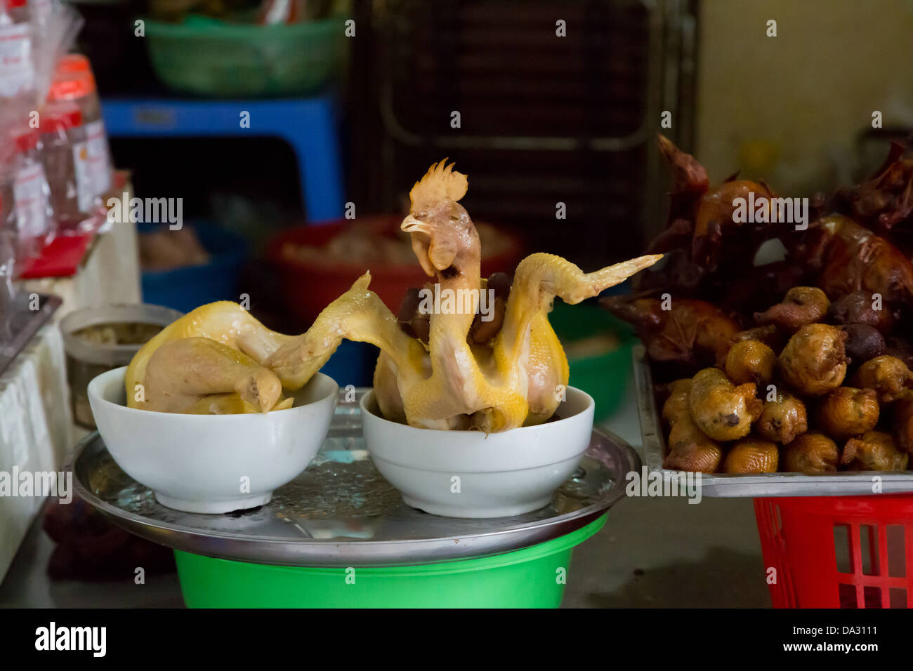 Dead Chicken waiting for the Grill in Hanoi, Vietnam Stock Photo