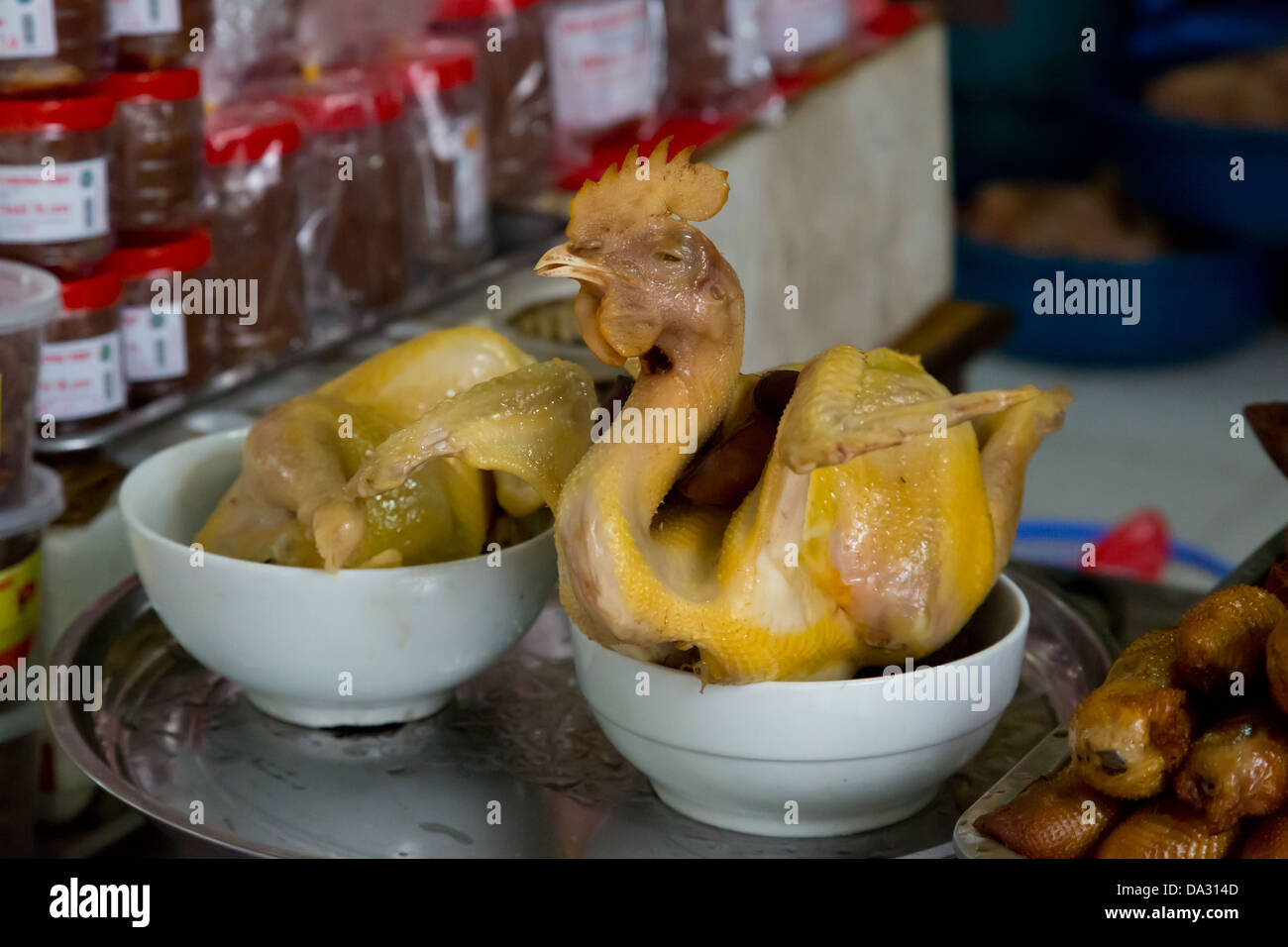 Dead Chicken waiting for the Grill in Hanoi, Vietnam Stock Photo