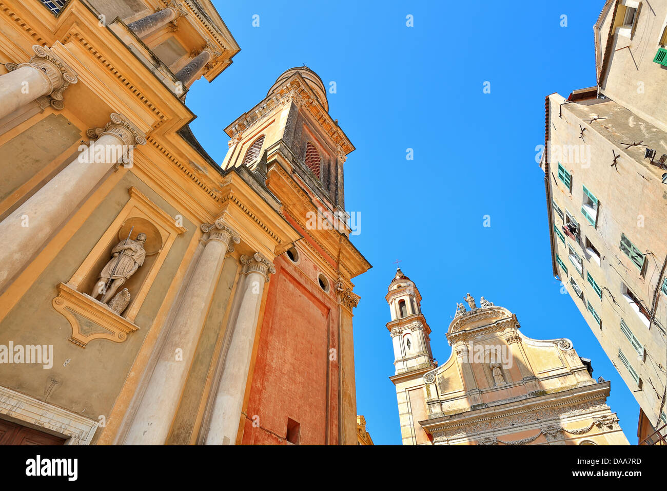 Fragment of Basilica Saint Michael Archange under blue sky in Menton, France. Stock Photo