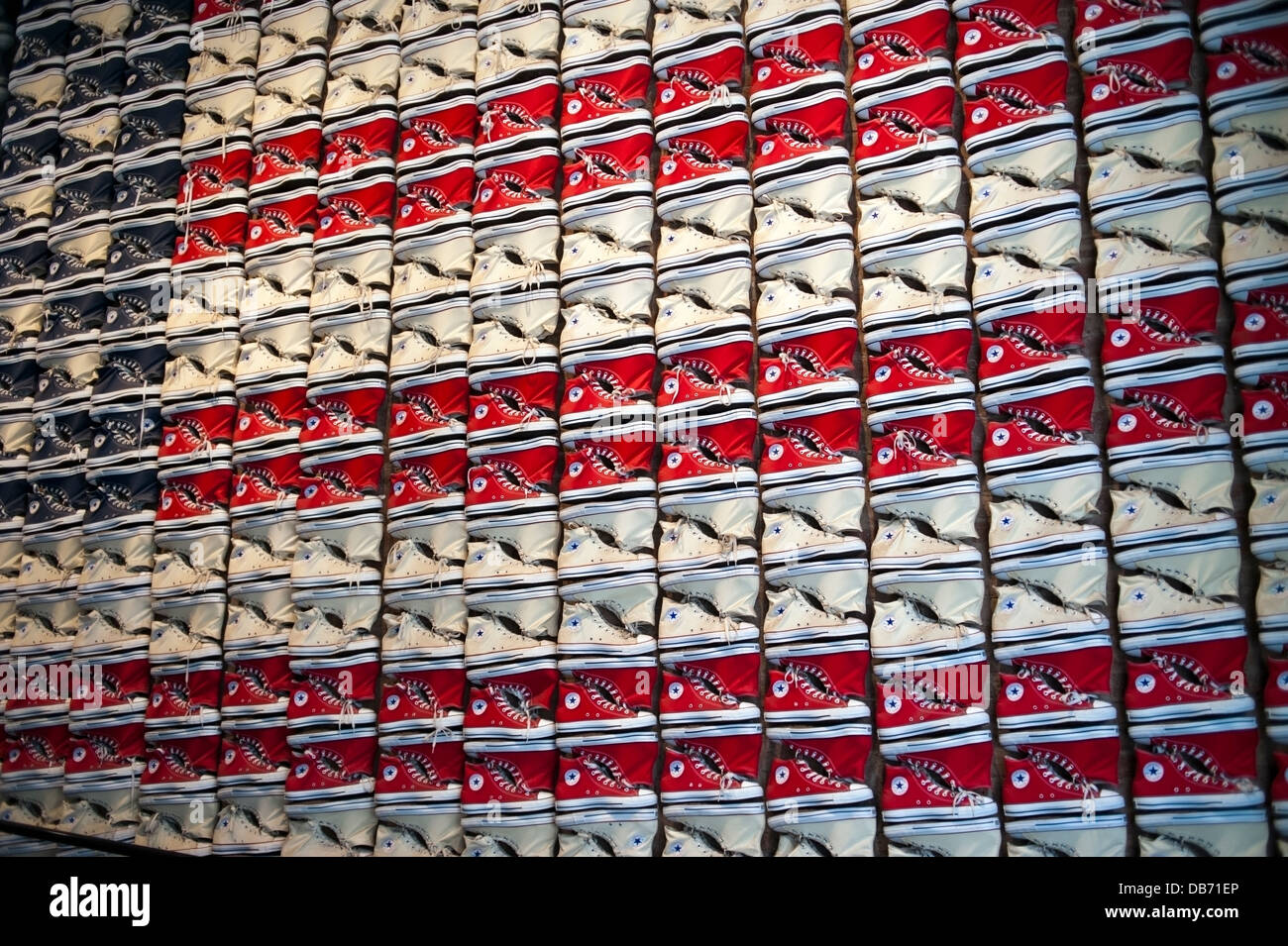 Converse Chuck Taylor All Stars tennis shoes displayed on the wall at the Converse Shoe store in New York City Stock Photo