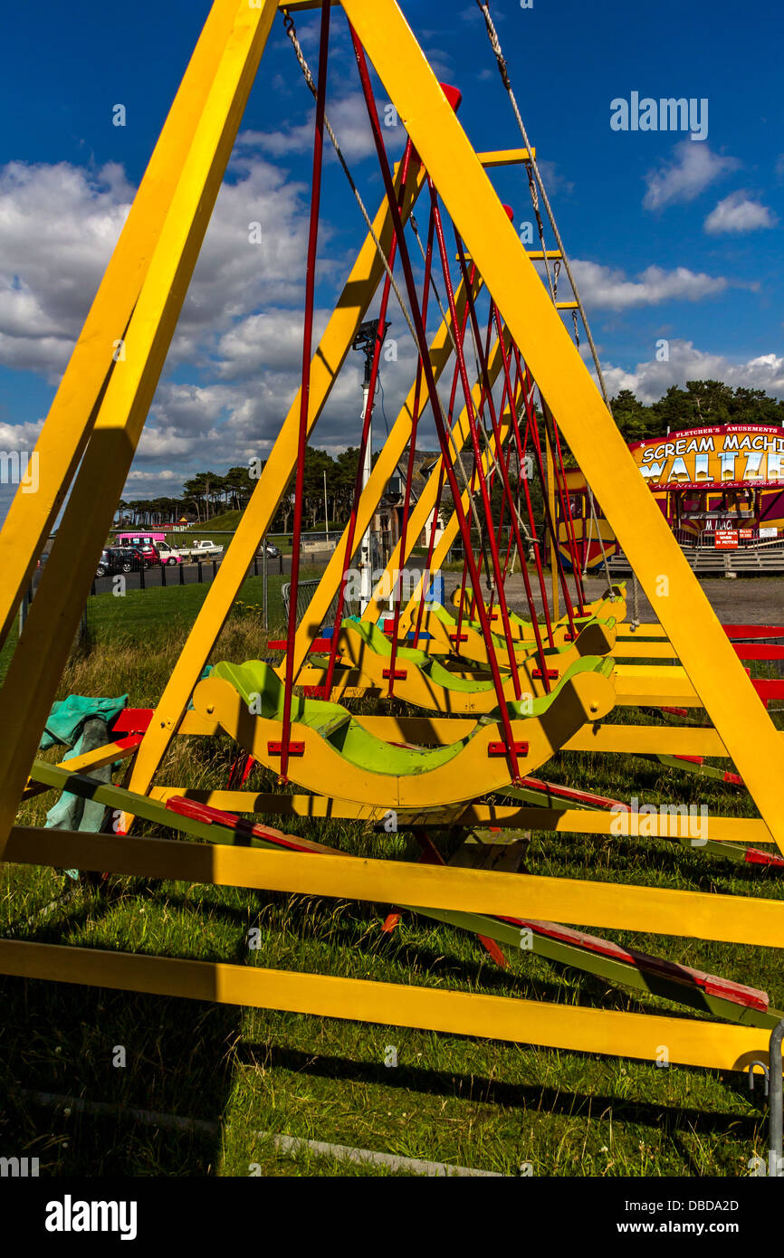 Old fashioned Boat swings Stock Photo