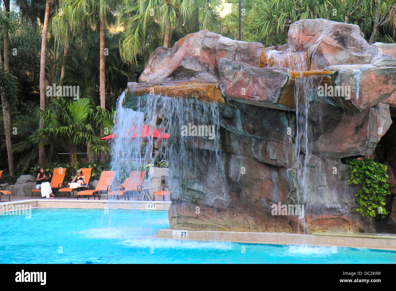 Florida Weston,Fort Ft. Lauderdale,Bonaventure Resort & Spa,hotel,swimming pool area,lounge chairs,umbrella,artificial man-made waterfall,looking FL13 Stock Photo