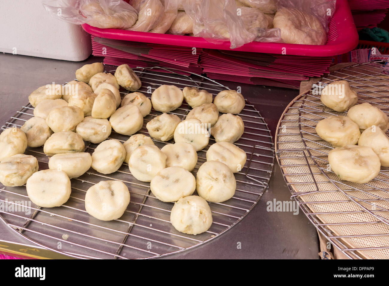 Mandu (dumplings, usually filled with port and vegetables) displayed by street stall, Seoul, Korea Stock Photo