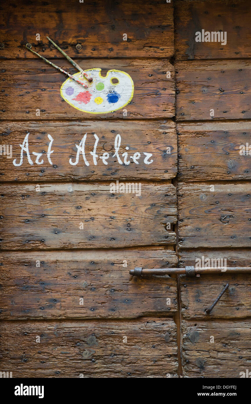 Old wooden door with the inscription Art Atelier, Rovinj, Istria, Croatia, Europe Stock Photo