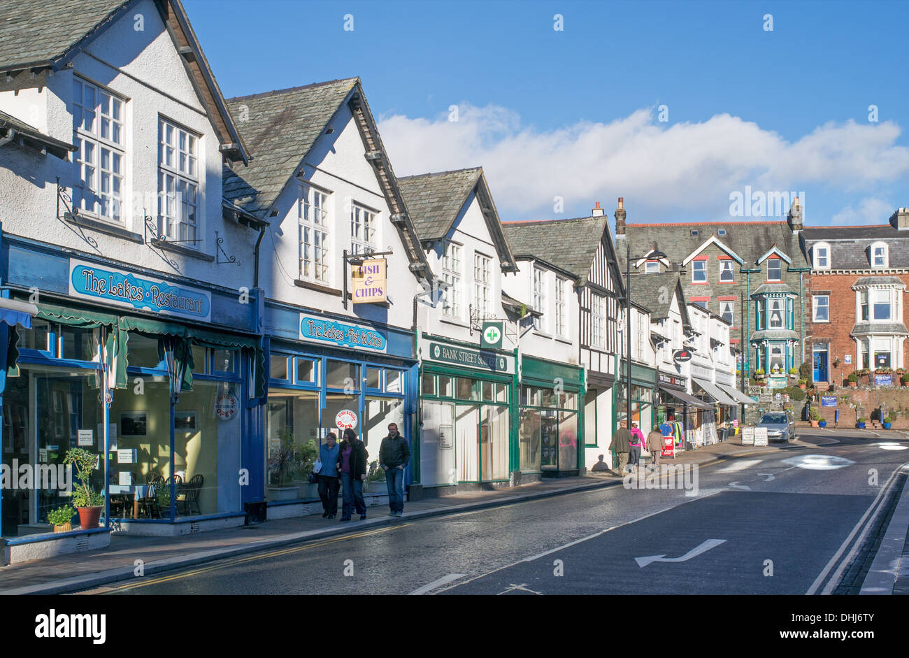 People walking along Bank Street, Keswick town centre, Cumbria, England, UK Stock Photo