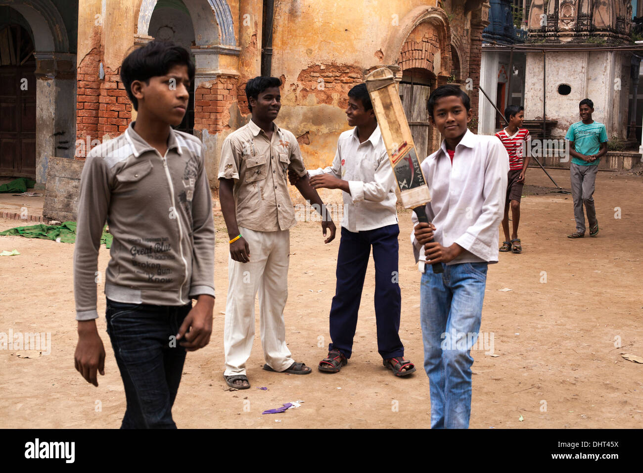 boys playing cricket in India Stock Photo