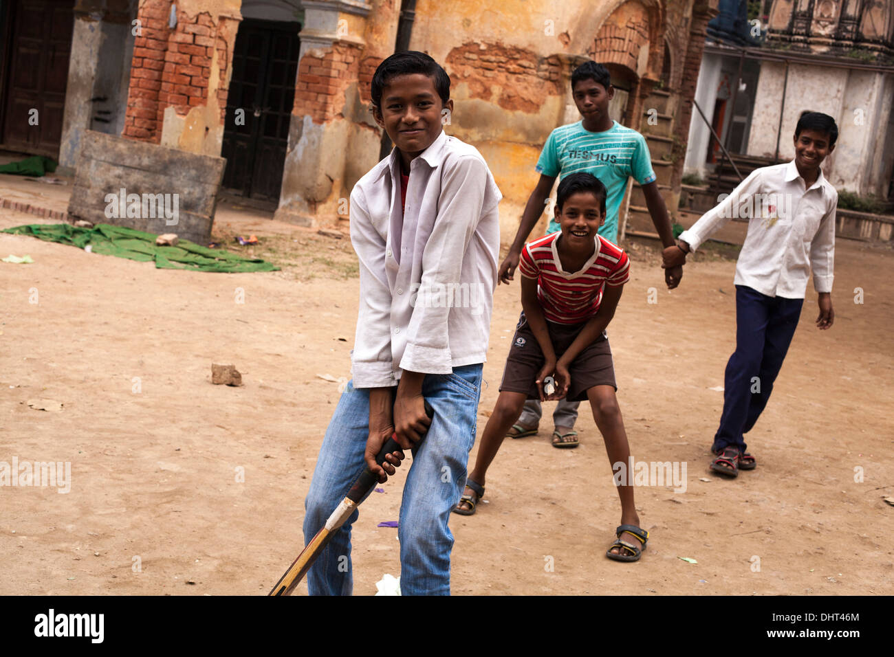 boys playing cricket in India Stock Photo