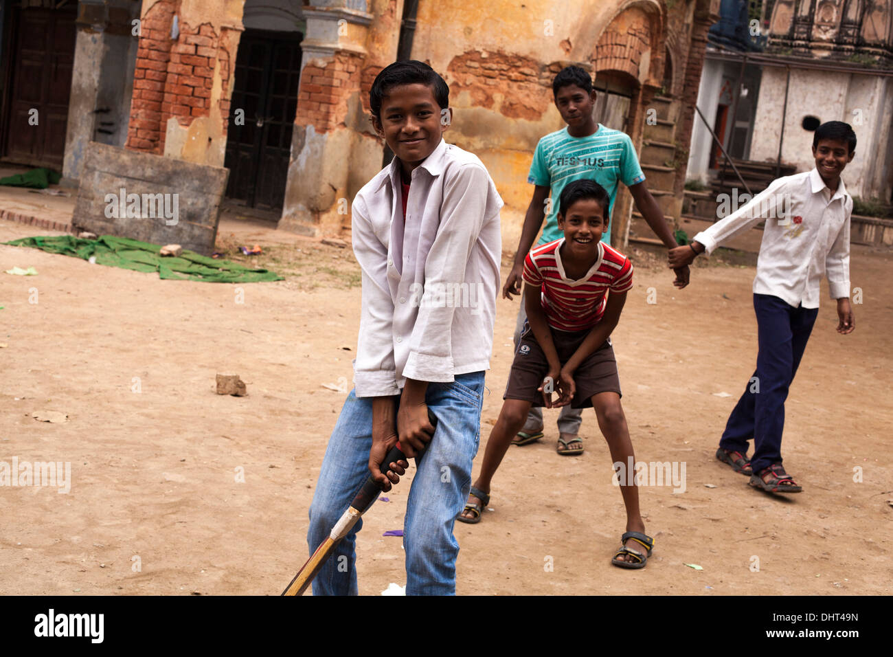 boys playing cricket in India Stock Photo