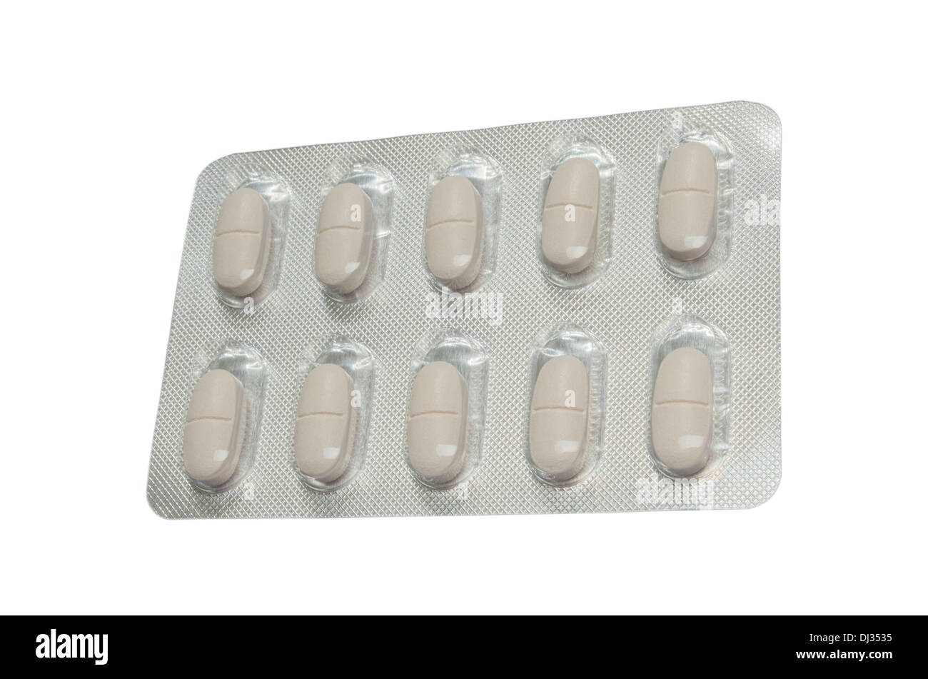 Oval Pills in Single Blister Sidewards Isolated Close-up Stock Photo