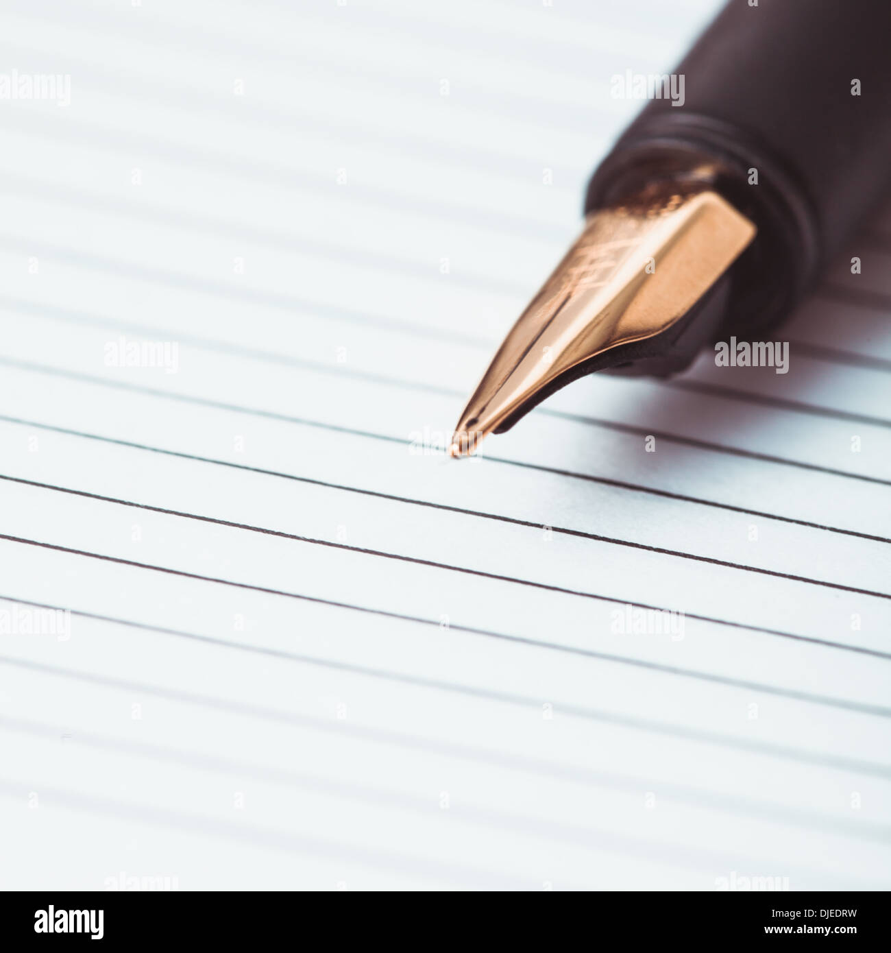 Metal feather pen Stock Photo