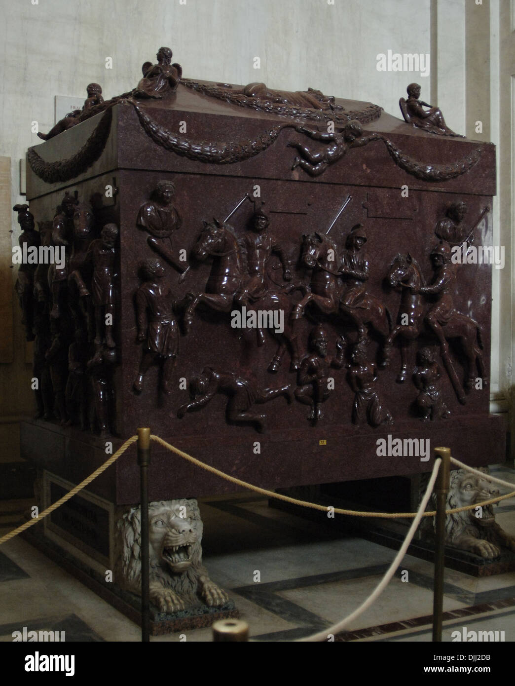 The sarcophagus of Helena. Red porphyry. Carved with military scenes with Roman soldiers on horseback and barbarian prisoners. Stock Photo