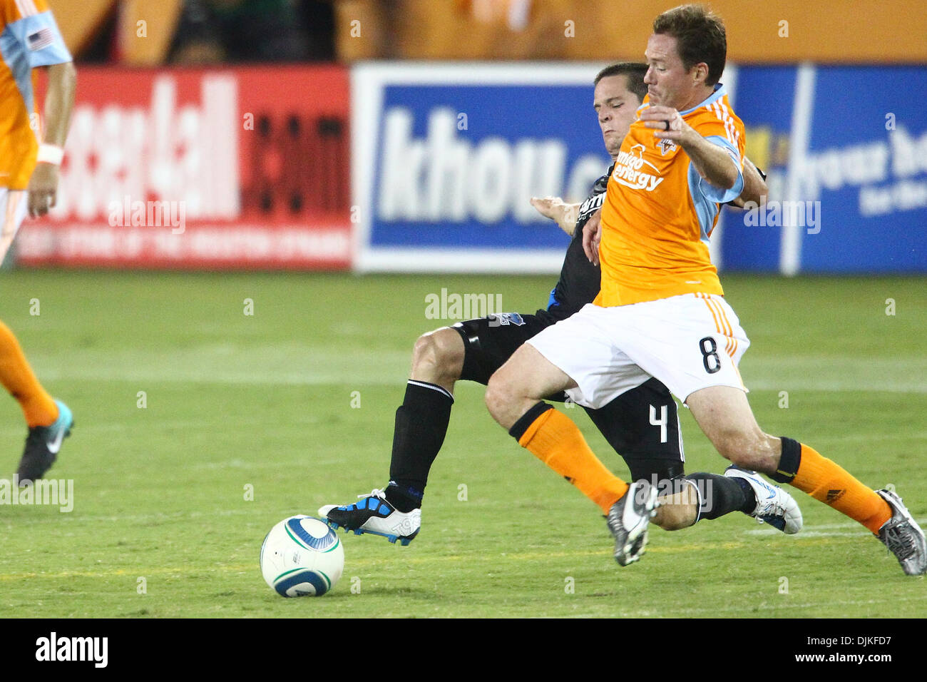 Sep. 05, 2010 - Houston, Texas, United States of America - Houston Dynamo D/M Richard Mulrooney (#8) and San Jose Earthquake D Christopher Leitch (#4) both dive for a loose ball.  The San Jose Earthquake defeated the Houston Dynamo 2-1 at Robertson Stadium in Houston, Texas. (Credit Image: © Anthony Vasser/Southcreek Global/ZUMApress.com) Stock Photo