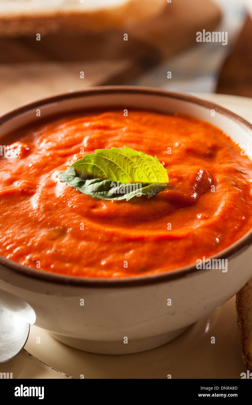 Creamy Tomato Basil Bisque Soup with Bread Stock Photo