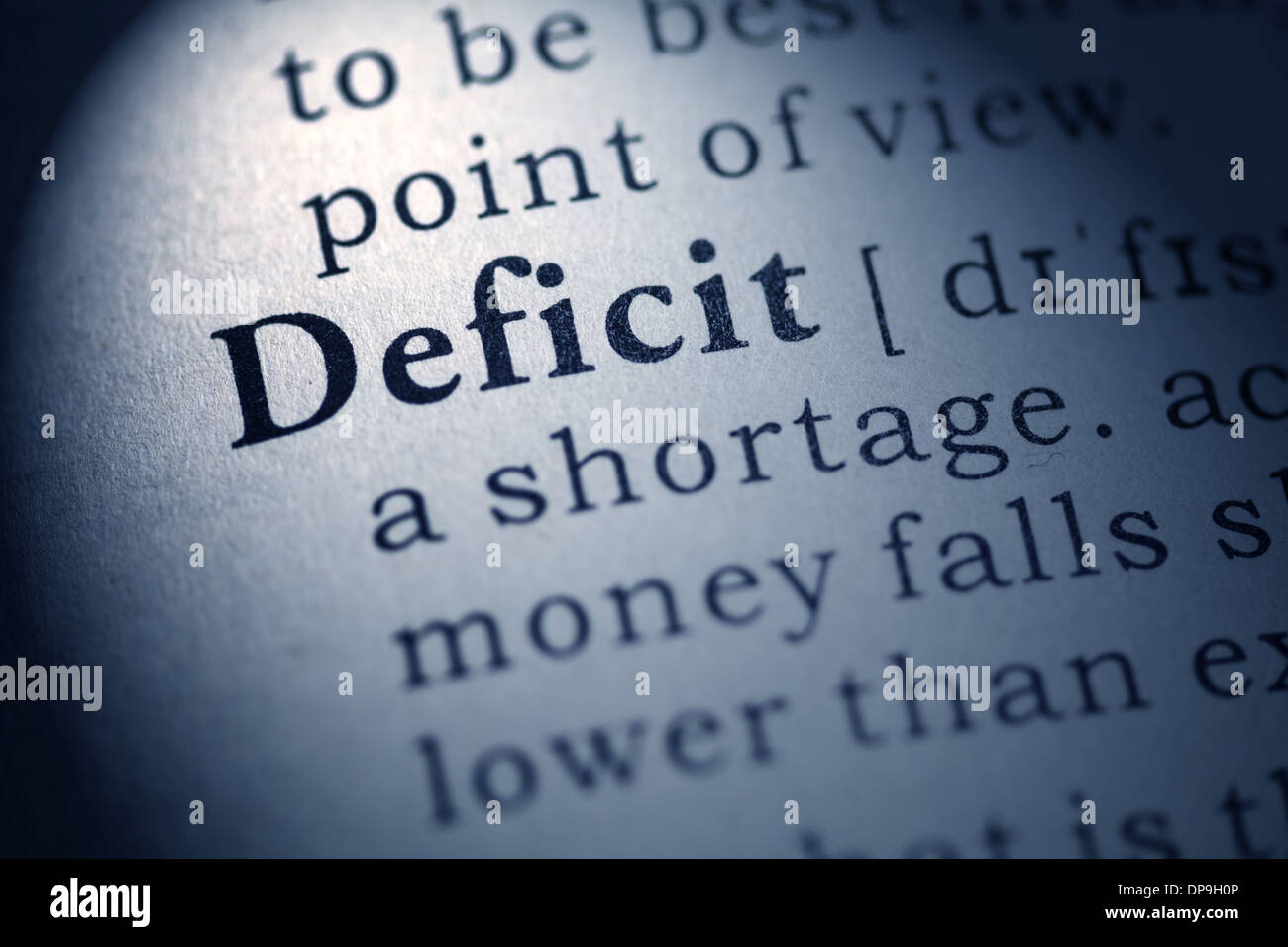 Fake Dictionary, Dictionary definition of the word deficit. Stock Photo