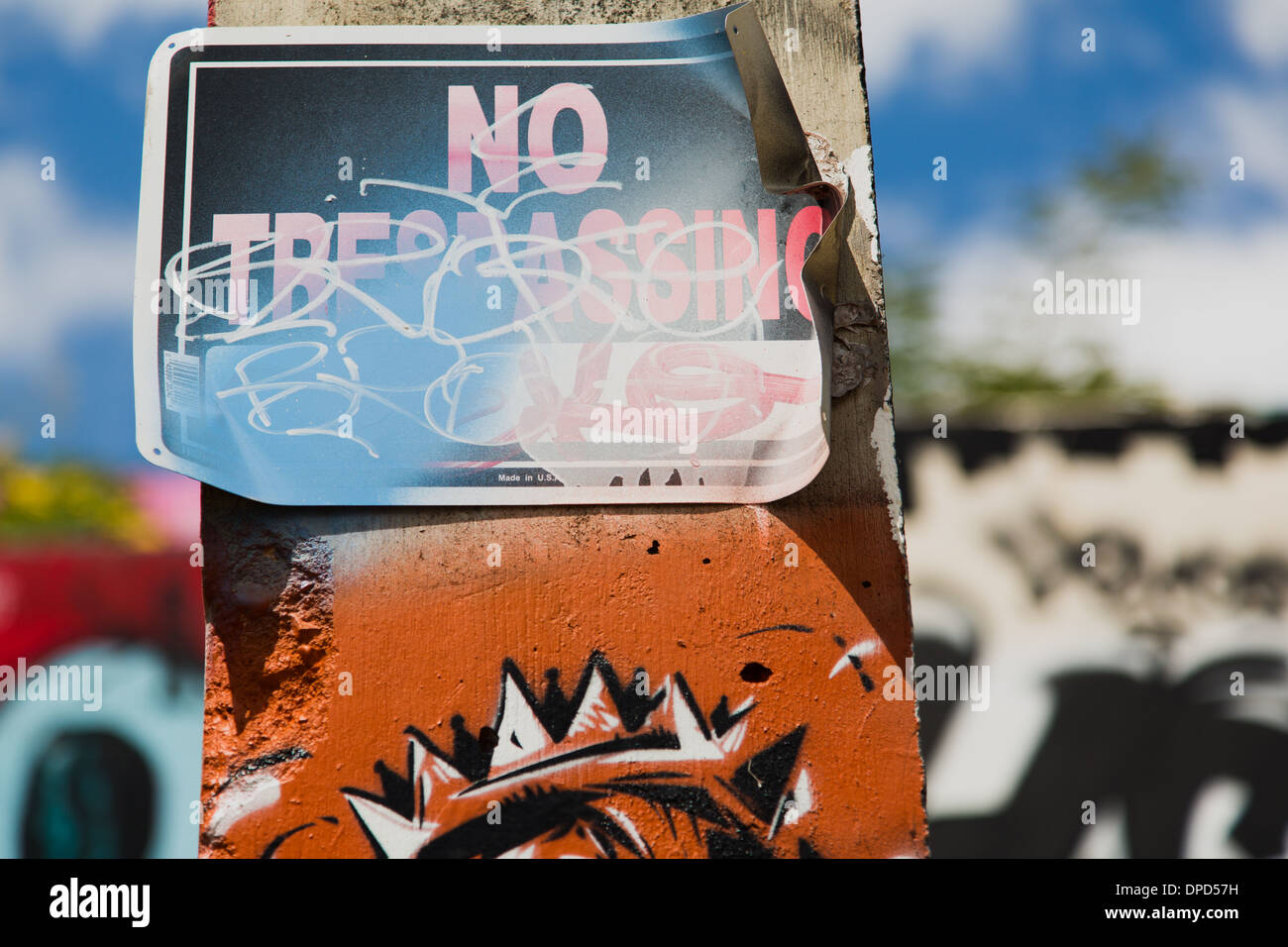 No trespassing sign and graffiti Stock Photo