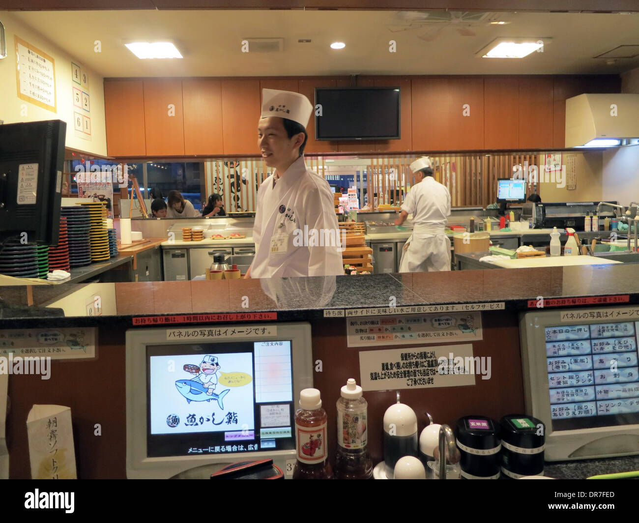 The chef of a sushi restaurant can see customers' order on a screen and react immediately in Gotemba, Japan, 17 April 2013. Photo: Peter Jaehnel - NO WIRE SERVICE Stock Photo