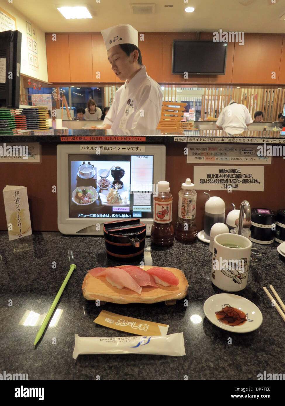 The chef of a sushi restaurant can see customers' order on a screen and react immediately in Gotemba, Japan, 17 April 2013. Photo: Peter Jaehnel - NO WIRE SERVICE Stock Photo