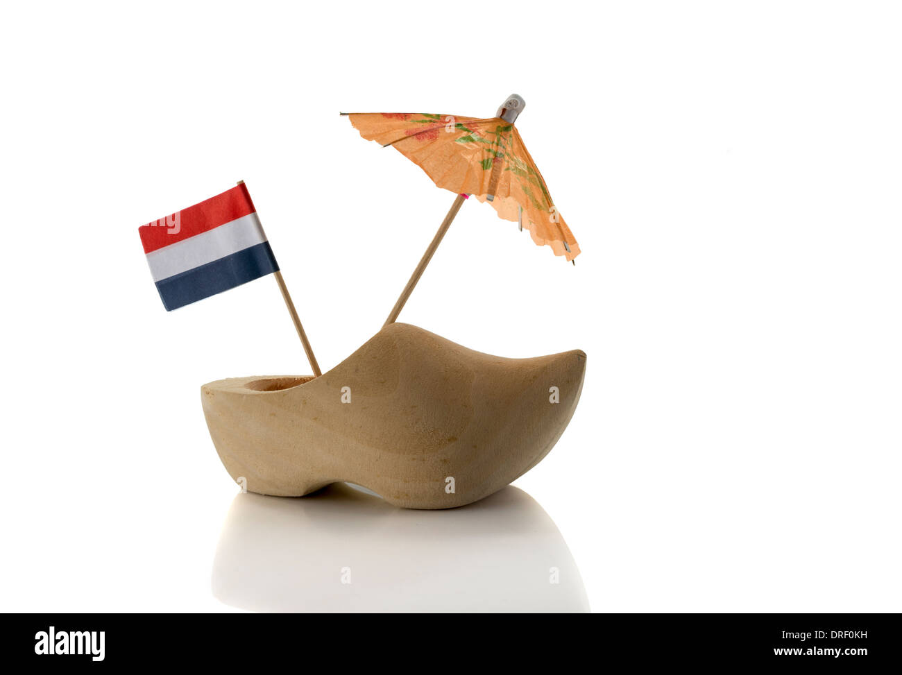 dutch wooden show with the flag and orange umbrella Stock Photo