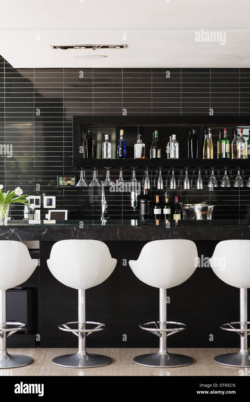 Empty stools at bar Stock Photo