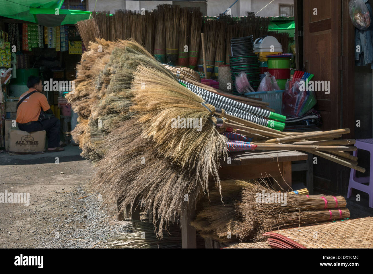 Brooms for sale at the market, Nyaungshwe, Inle Lake, Myanmar Stock Photo