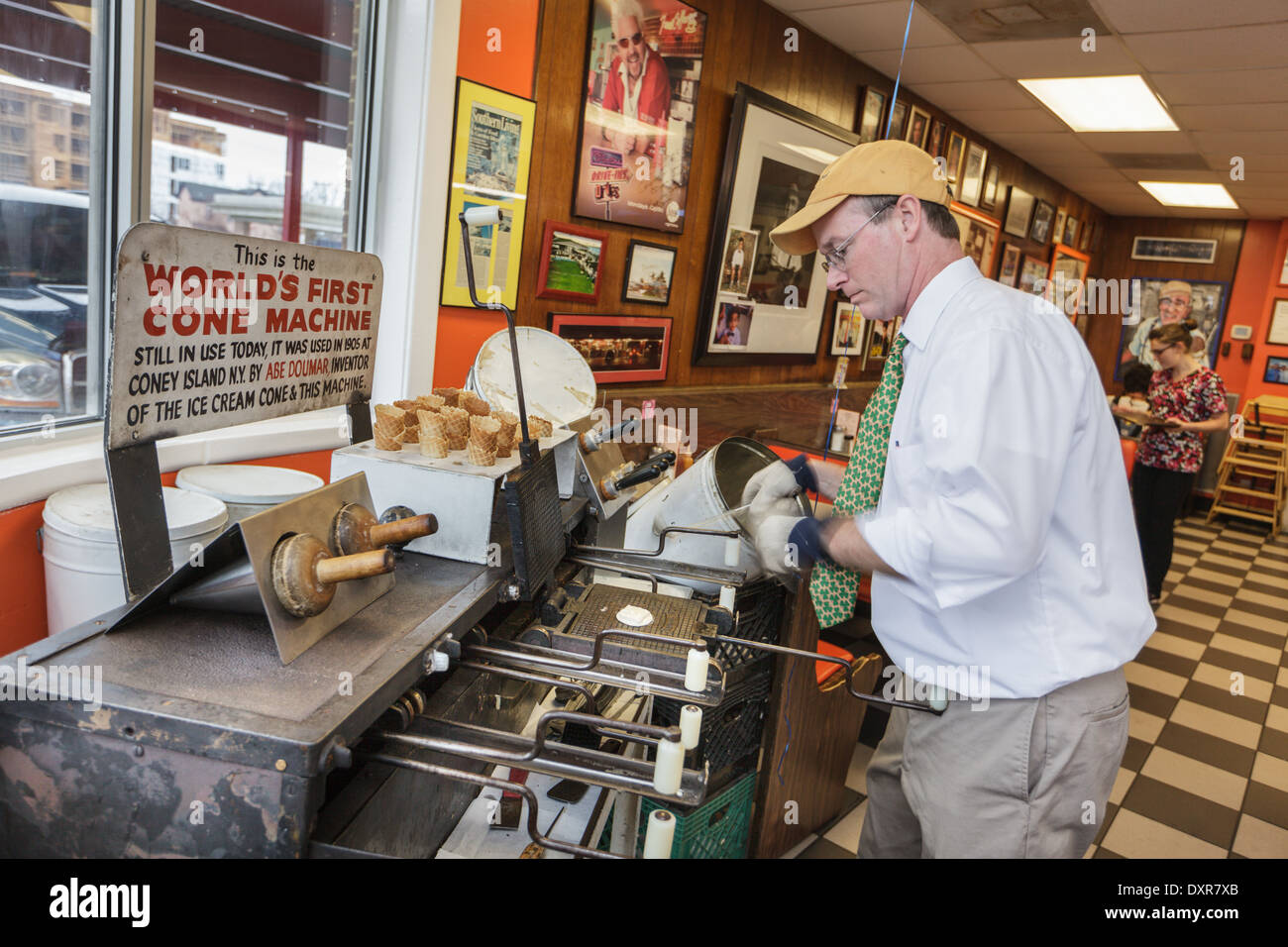 Making ice cream cones on the original cone machine at Doumar's Cones and Barbecue in Norfolk, Virginia Stock Photo