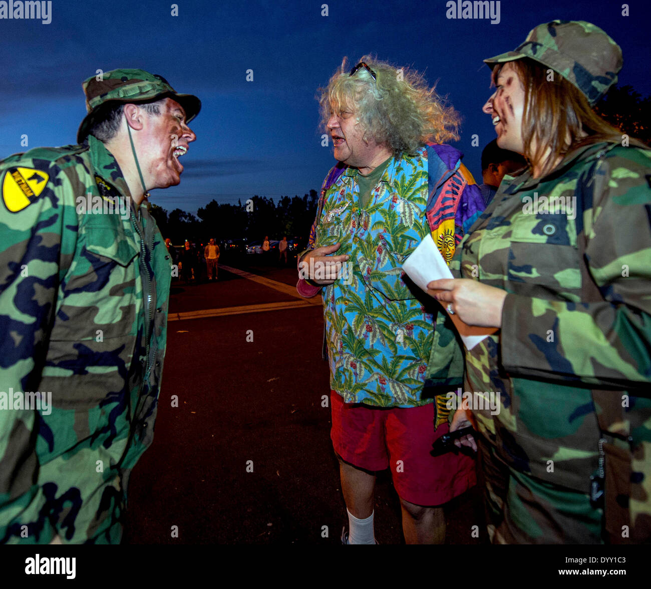 Fountain Valley, California, USA. 26th Apr, 2014. JEFF DOWD, the inspiration for Jeff Bridges' iconic character ''The Dude'' (center), talks with fans at the Lebowski Fest Bowling Party. The fan-based festival celebrates the Coen Brothers' 1998 cult film, 'The Big Lebowski. © Brian Cahn/ZUMAPRESS.com/Alamy Live News Stock Photo