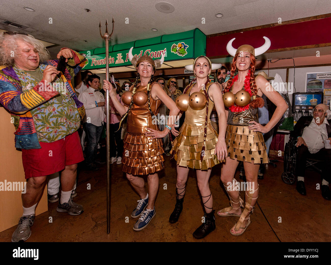 Fountain Valley, California, USA. 26th Apr, 2014. Film wardrobe costuming is de rigeuer for the Lebowski Fest Bowling Party at Fountain Bowl. Making a photograph at left is JEFF DOWD, the inspiration for the Jeff Bridges character 'The Dude' in the Coen Brothers' 1998 cult film, 'The Big Lebowski. © Brian Cahn/ZUMAPRESS.com/Alamy Live News Stock Photo