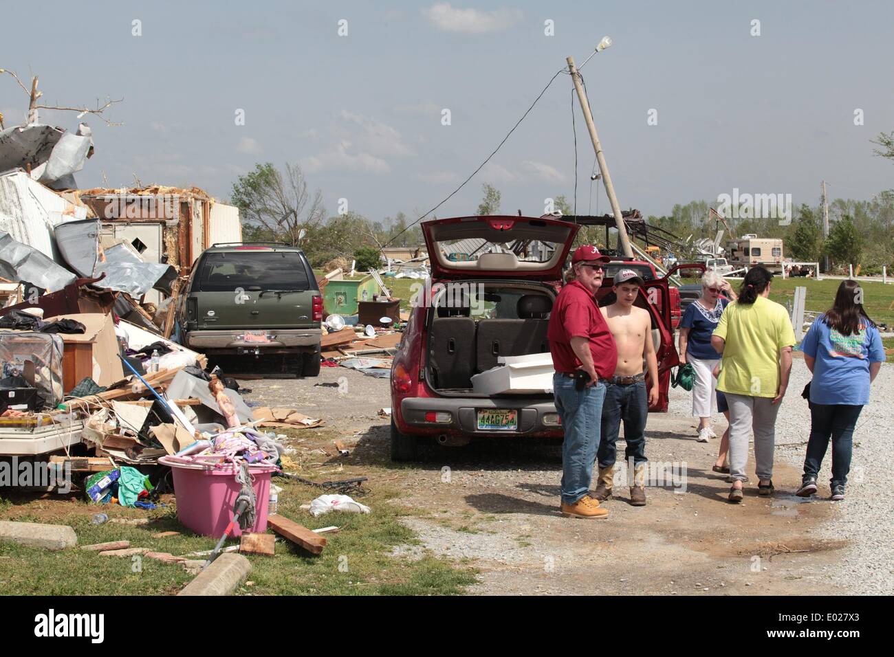 Athens, Alabama, USA. 29th Apr, 2014. People survey damage at the Billy Bob Trailer Park in Athens in Alabama, the United States, April 29, 2014. Authorities said on Monday that 15 people were killed in a string of tornadoes that ripped across large swath of the central and southern United States late Sunday and early Monday, leveling houses, downing trees and reducing everything on their ways to rubble and debris. Credit:  Marcus DiPaola/Xinhua/Alamy Live News Stock Photo