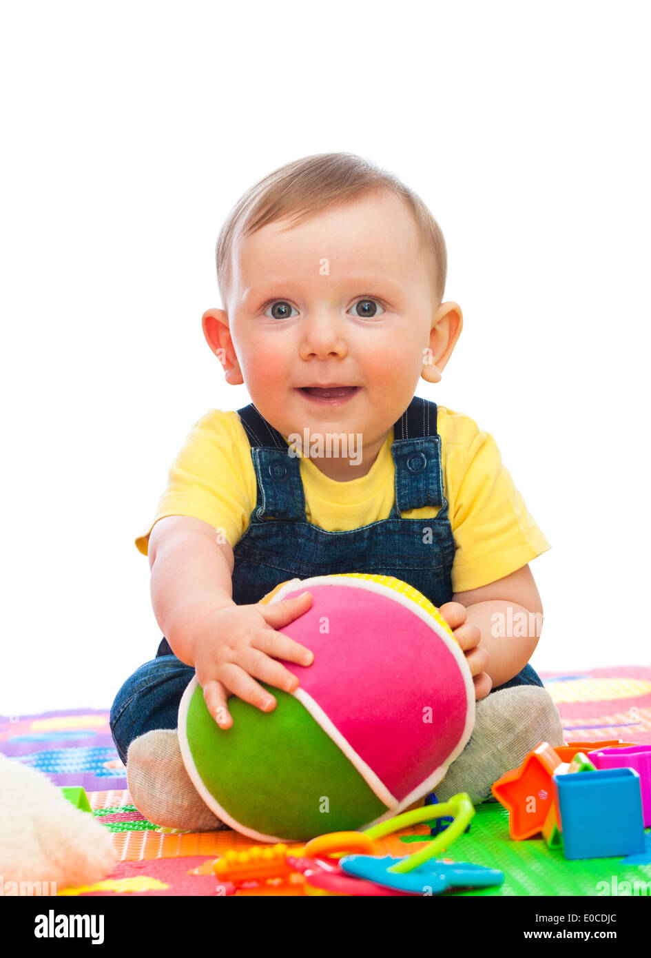 portrait of caucasian bay playing with toy Stock Photo