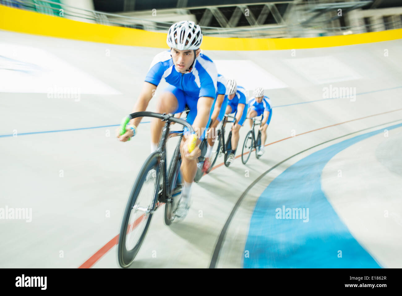 Track cyclist racing in velodrome Stock Photo