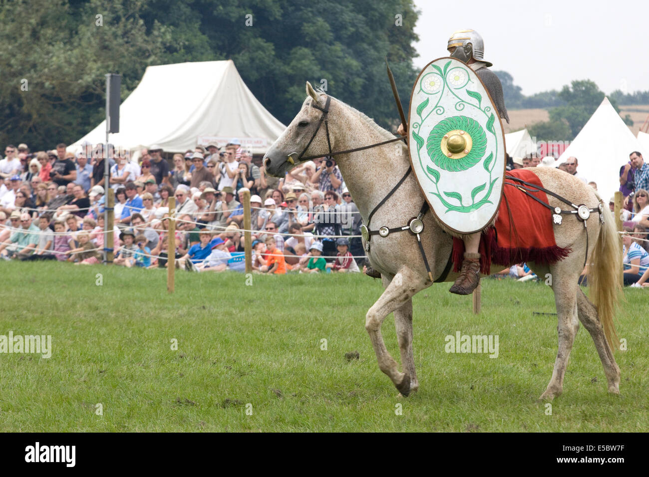 Roman Cavalry soldier on a Palomino horse Stock Photo