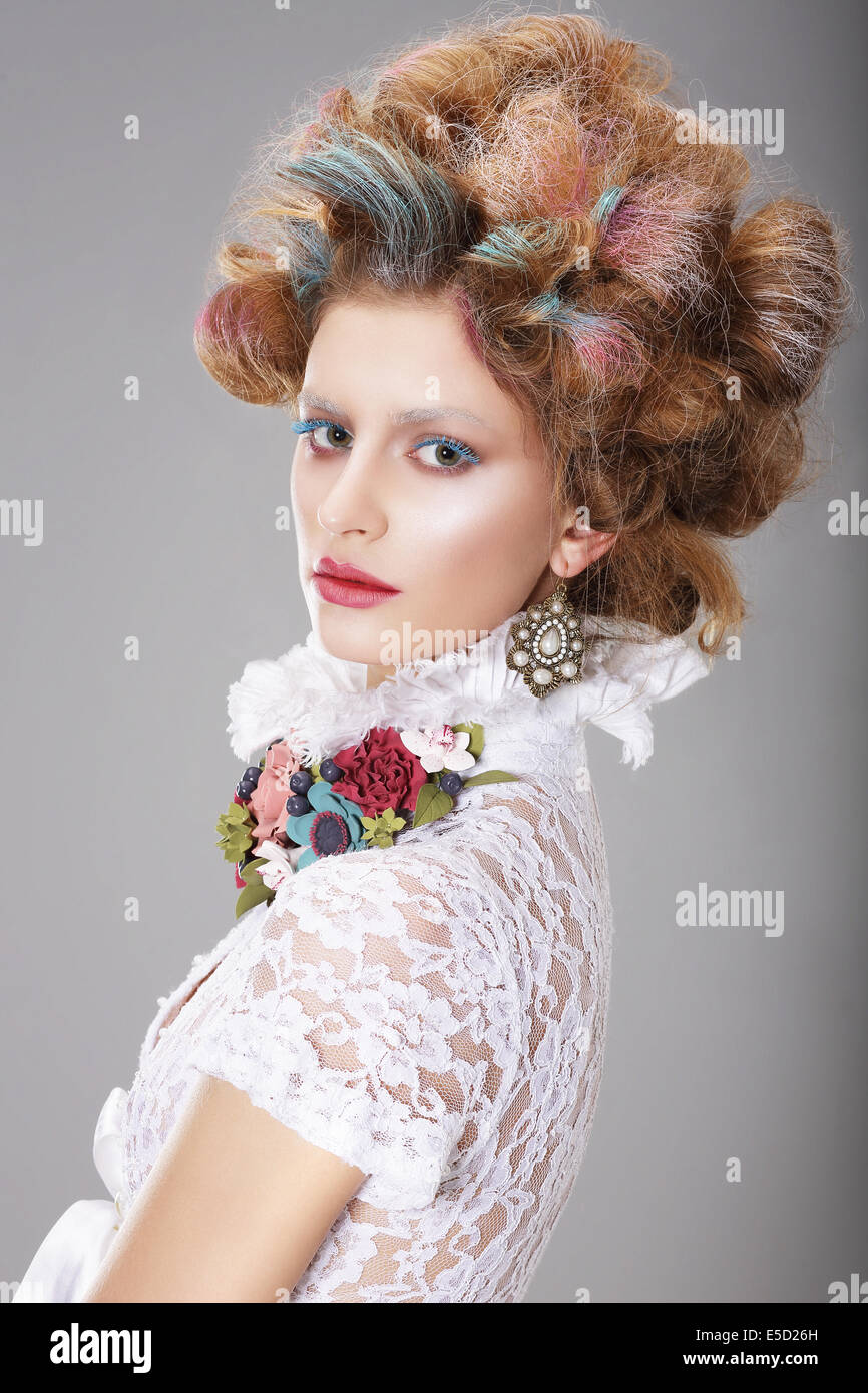 Glamorous Woman with Stylized Fanciful Coiffure Stock Photo