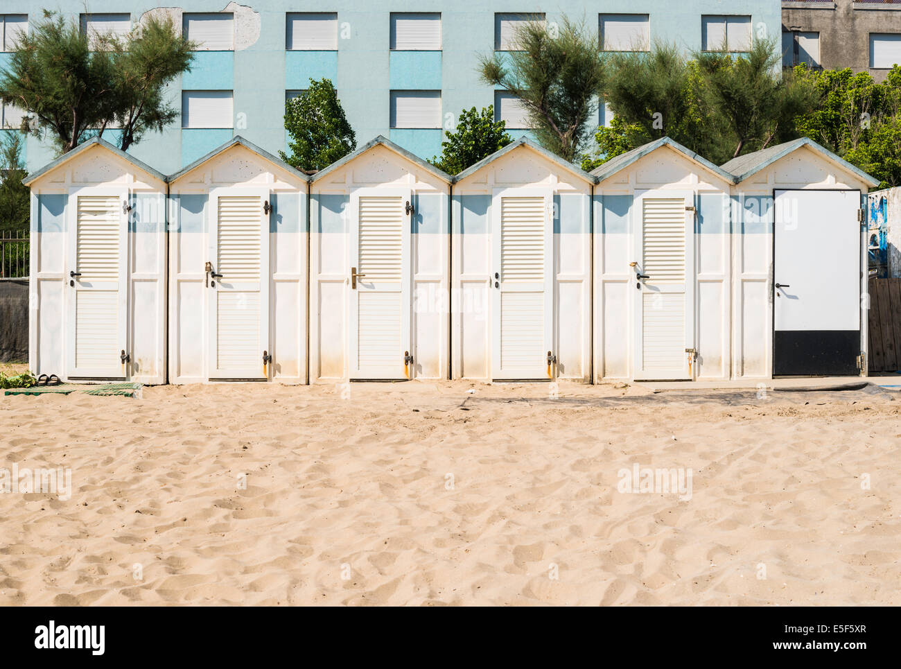 White wooden cabins on the beach. Stock Photo