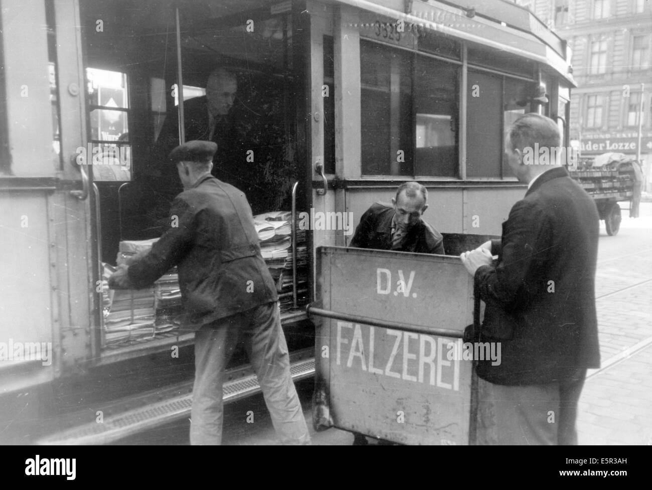 The picture from a Nazi news report shows a Berlin public transport authority (B.V.G.) street car transporting newspapers instead of passengers in Berlin, Germany, October 1944. The original text on the back of the picture reads: 'Life in Berlin today - The B.V.G. has taken over the transport  of fruit, vegetables, newspapers, coal and other things. Newspapers, fruit, vegetables coal instead of passengers, a new addition to Berlin's street life.' Fotoarchiv für Zeitgeschichte - NO WIRE SERVICE Stock Photo