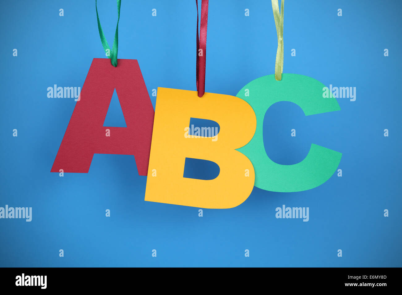 Paper ABC. Blue Background. Stock Photo