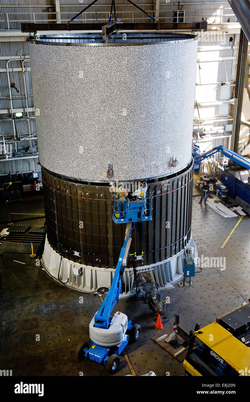 Engineers position a 27.5-foot-diameter cylinder for the first full-scale Shell Buckling and Knockdown Factor Project test held Stock Photo