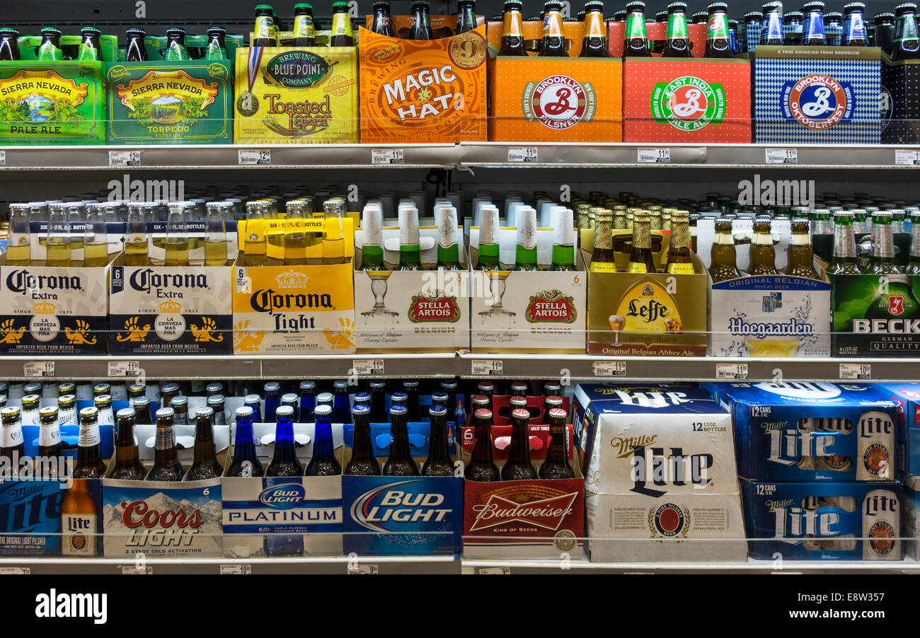 Six-packs of various beer brands on a supermarket shelf in New York City, USA Stock Photo