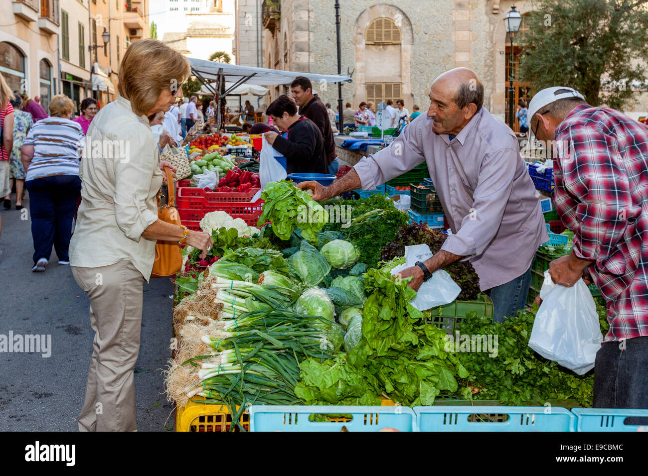 Local Women Buying Vegetables At The Thursday Market In Inca, Mallorca - Spain Stock Photo