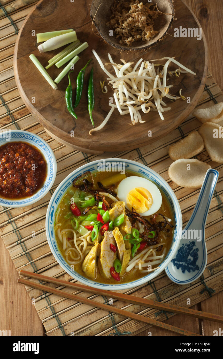 Soto ayam. Chicken and noodle soup. Indonesia Food Stock Photo