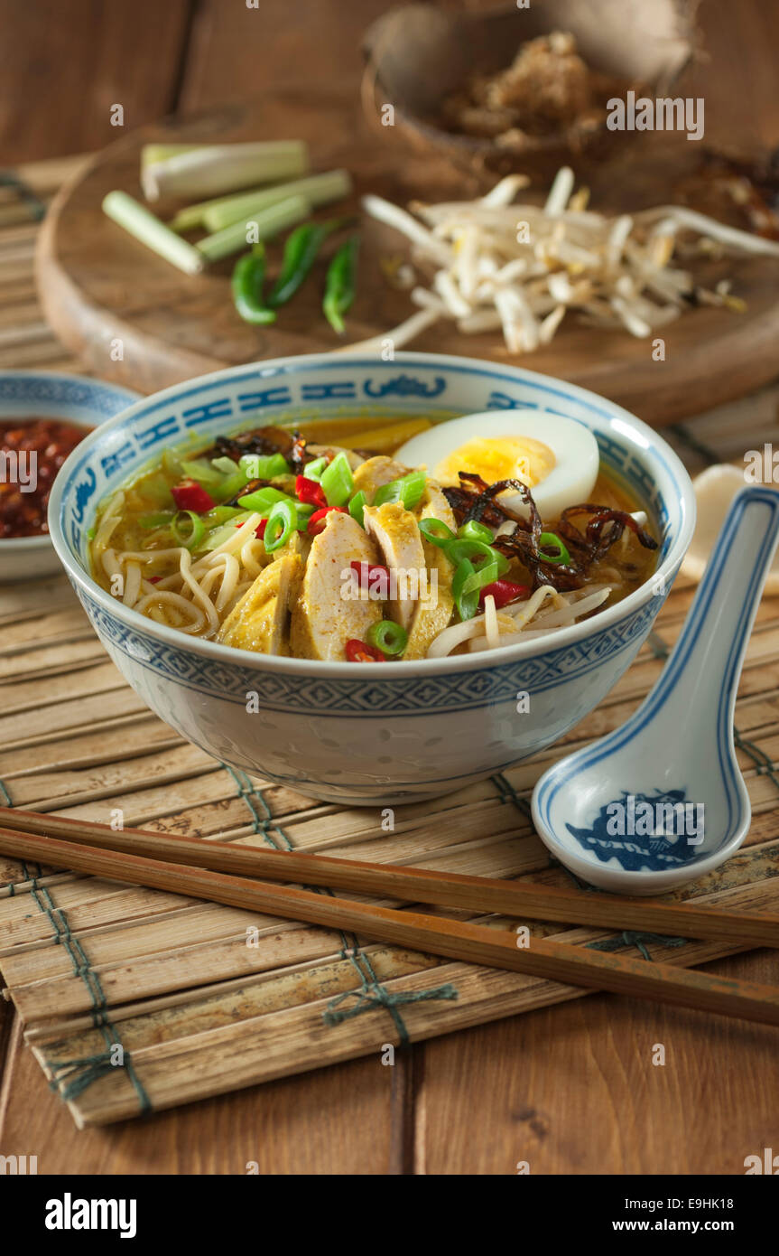 Soto ayam. Chicken and noodle soup. Indonesia Food Stock Photo