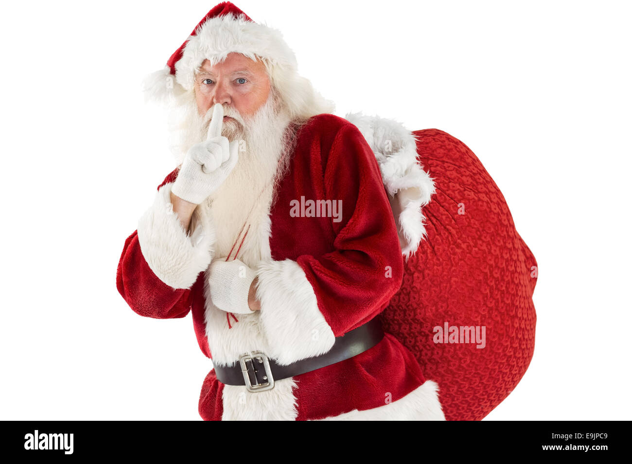 Santa asking for quiet with bag Stock Photo