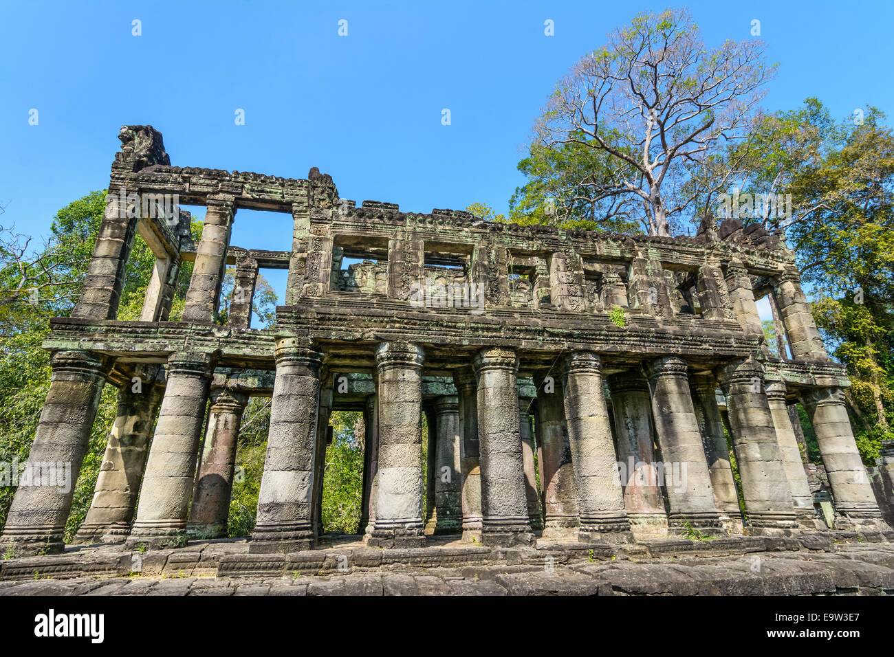 Preah Khan was built in 1191 during the reign of King Jayavarman VII. The central Buddhist temple included an image of the Boddh Stock Photo